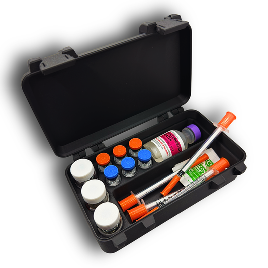 Open snap-lock storage case showing organized layout for wellness supplies. Holds three 10ml vials, six 3ml vials, one larger BAC water vial, and a long compartment for syringes and alcohol wipes. Items are upright and separated inside a rugged black travel-ready case designed for TRT, HRT, GLP-1, insulin, and general wellness routines.