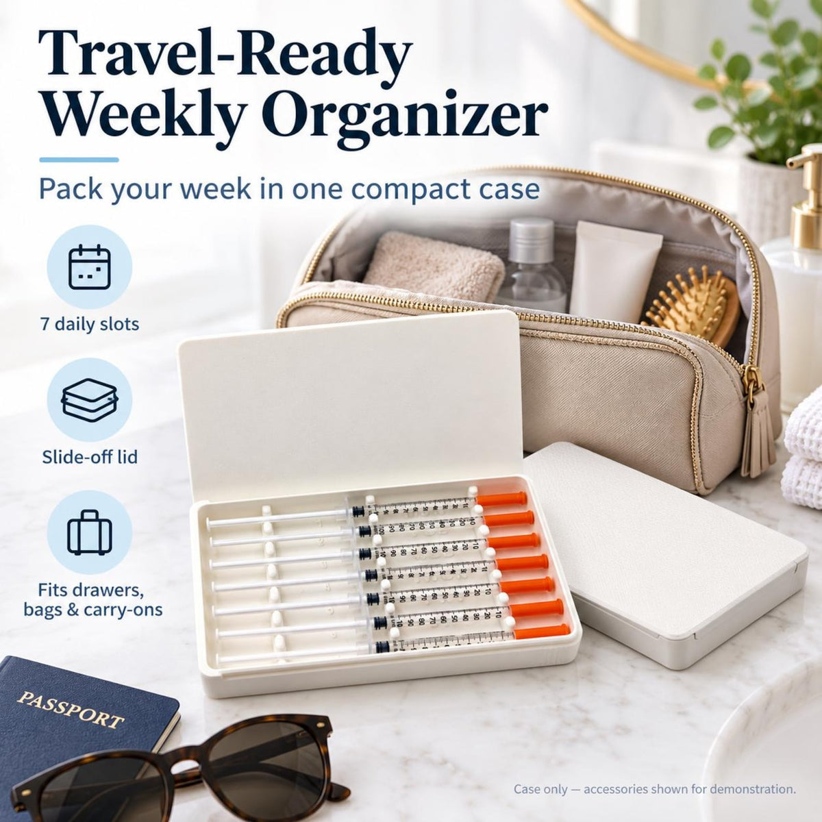 White weekly syringe case with 7 prefilled syringes beside toiletry bag, passport, and travel accessories.
