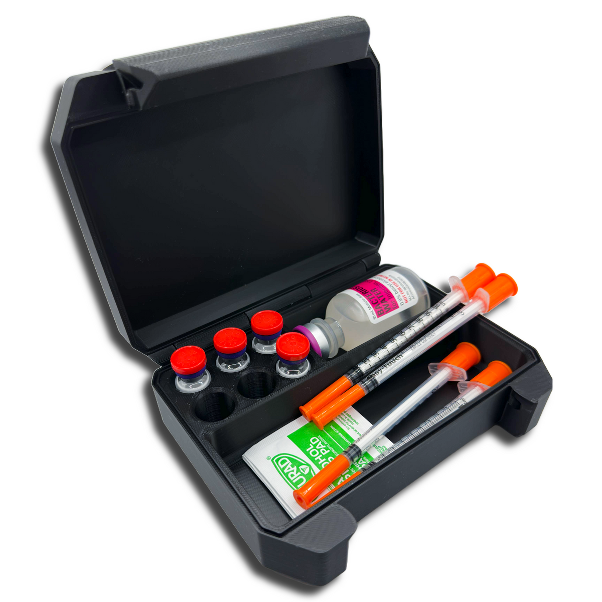 Black travel case with medical supplies including syringes and vials on a white background