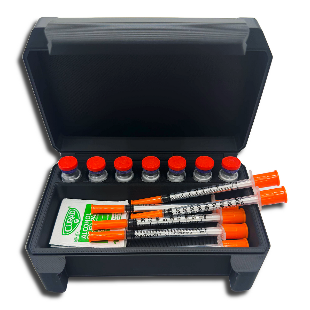Compact seven-slot vial organizer with accessory space for injection supplies