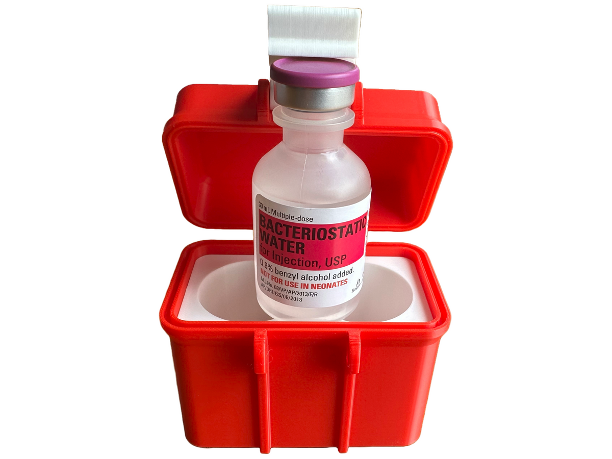 Open front view of the 2-vial BAC Water Storage Case displaying one Hospira brand bacteriostatic water vial inserted into one of the precision-fit compartments. The case features a red 3D printed body with a white interior insert and a hinged lid that snaps shut securely for portable or home storage.