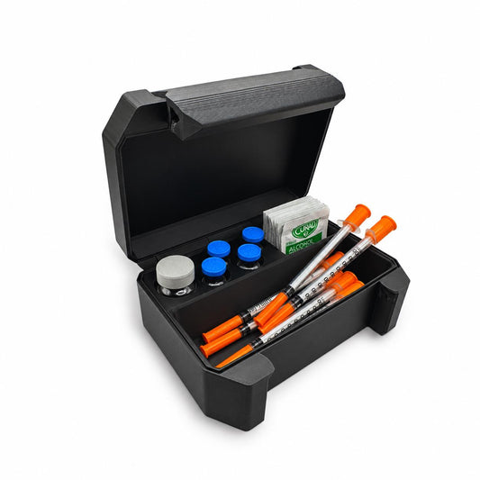 Open black compact vial and syringe travel case with one 10ml vial, four 3ml vials, syringes and prep pads on white.