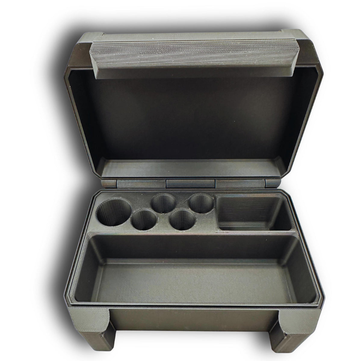 Empty black compact vial and syringe travel case showing five vial positions, a syringe compartment and wipe slot.