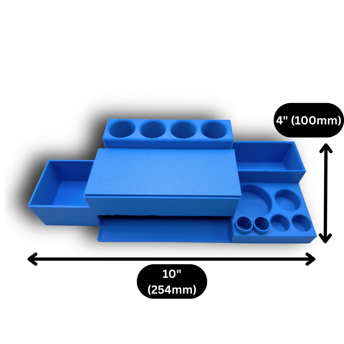 Empty blue desktop organizer with four pen slots, syringe dispenser and separate supply compartments; dimension arrows show 10-inch width and 4-inch depth.