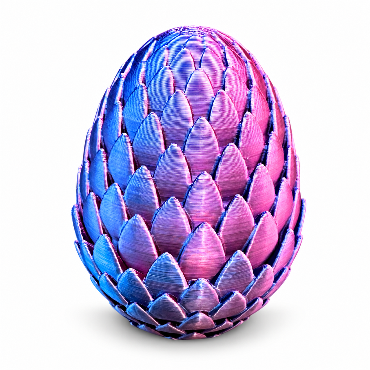 Closed blue, purple and pink dragon egg vial storage case with a scale-patterned shell, shown upright.