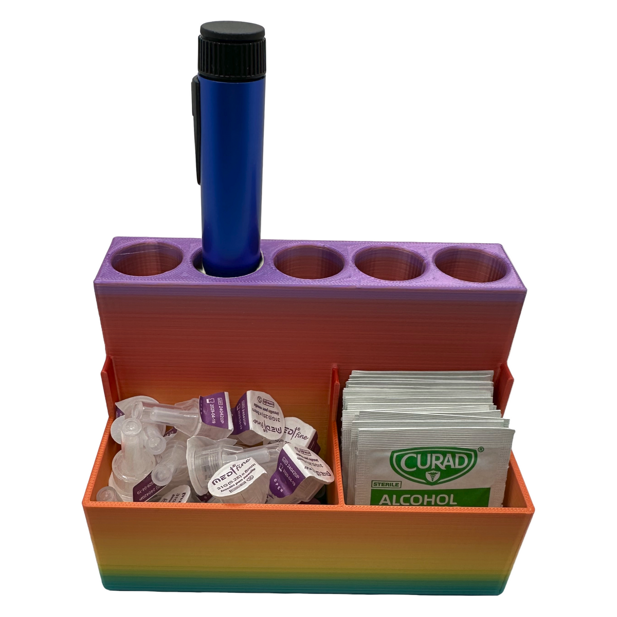 Front view of a fully loaded peptide pen desktop organizer with a pen, alcohol wipes, and needle tips. Compact 3D printed case designed for GLP-1 users managing semaglutide, tirzepatide, or insulin routines with organized, easy-access storage.