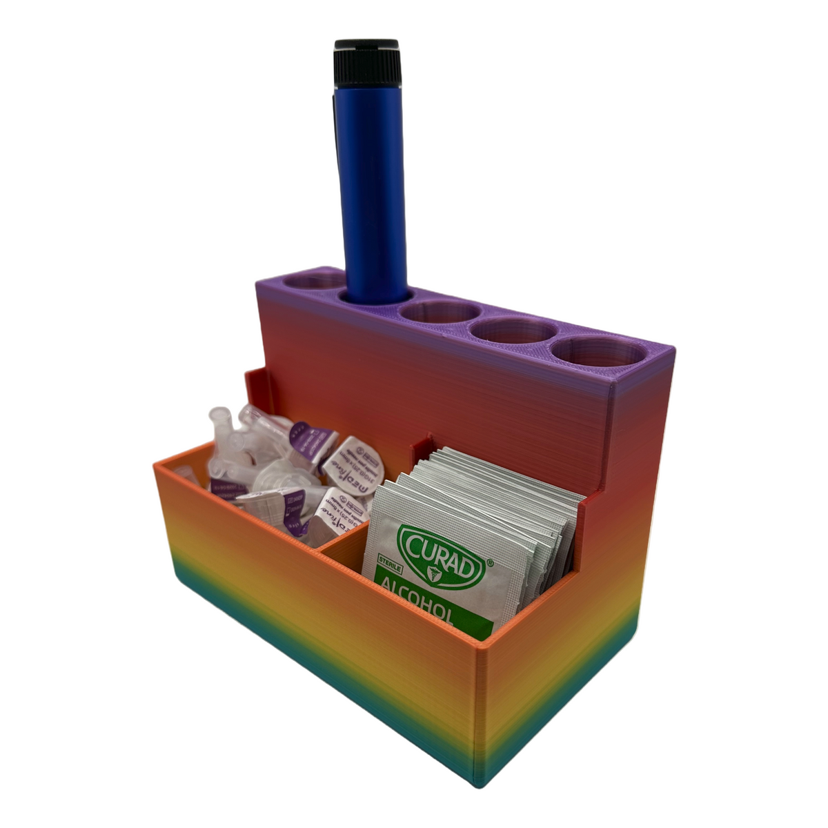Angled perspective of the organizer holding one injection pen with compartments neatly storing Curad alcohol pads and pen needle tips. Designed for GLP-1 or peptide therapy users who need clean, organized storage on their counter or nightstand.