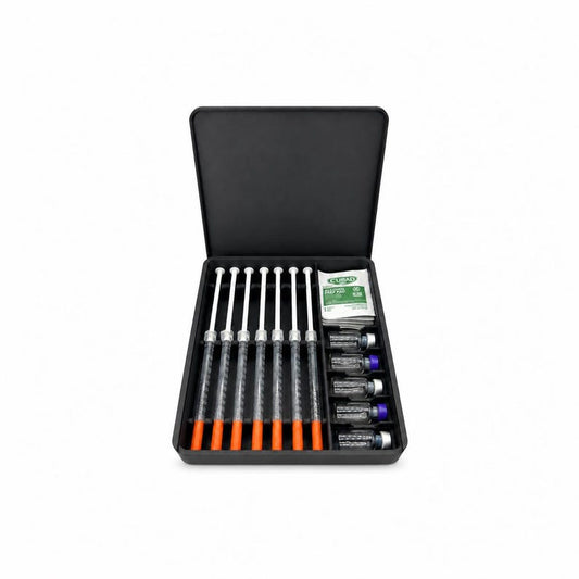 Open black weekly prefilled syringe storage case on a white background, showing seven 1ml syringes in individual slots, five 3ml vials along the right side, prep wipes in a separate compartment, and the lid standing behind the case.