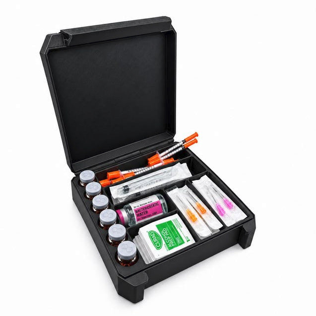 Open black 10ml vial case holding six vials with separate compartments for syringes, needles, alcohol prep pads and a BAC water bottle on white. Supplies not included.