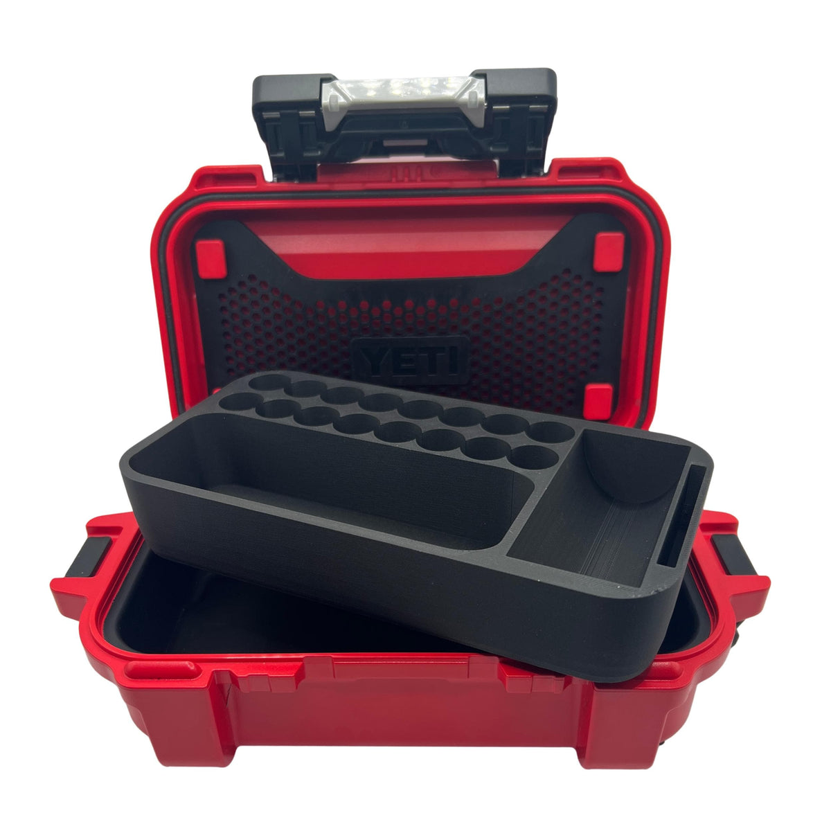 3D printed vial organizer insert shown being placed into an open YETI GoBox 1, demonstrating the precision drop-in fit. Empty insert displays 16 individual 3ml vial slots along the back row, long open compartment for syringes and injection pens, and dedicated corner slot for a 30ml bacteriostatic water bottle with side slot for wipes. Custom-fit travel medicine organizer insert made in the USA — YETI GoBox case not included, insert available in multiple colors.