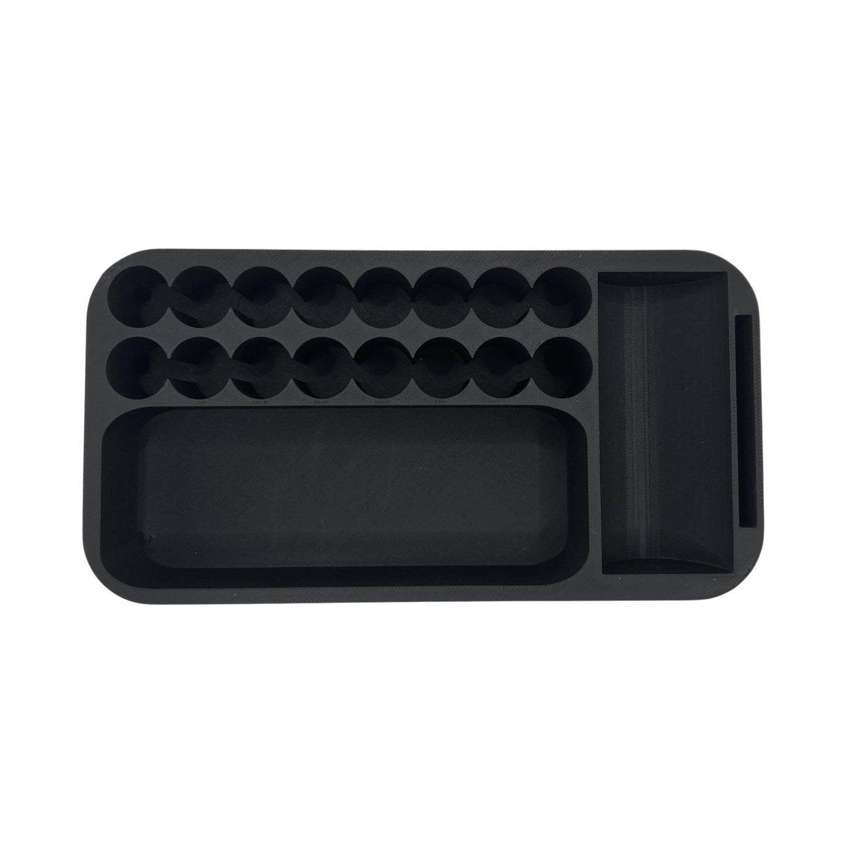 Top-down view of 3D printed vial organizer insert for YETI GoBox 1 showing complete compartment layout: 16 individual 3ml vial slots arranged in two rows of eight, long rectangular compartment for syringes and injection pens, dedicated slot for one 30ml bacteriostatic water bottle, and slim side slot for alcohol wipes or flat accessories. Precision-fit drop-in travel medicine storage insert, made in the USA and available in your choice of colors.